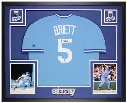 Maillot bleu de Kansas City signé et encadré par George Brett avec certificat Beckett de l'autographe